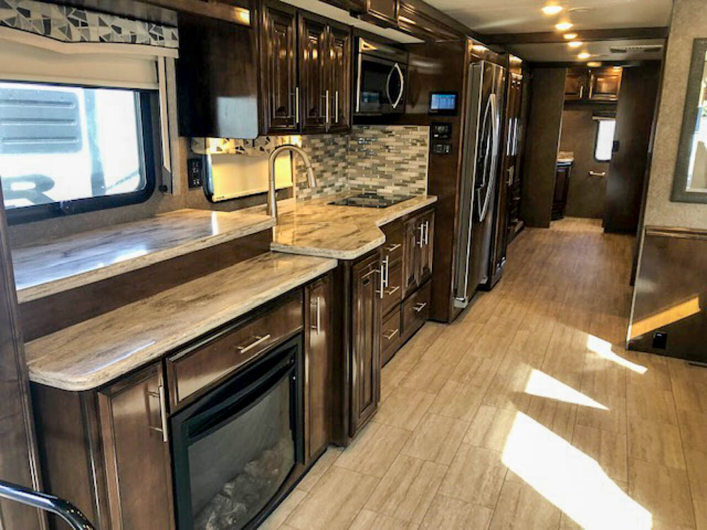 2019 Thor Motor Coach Challenger 37FH, kitchen & living area